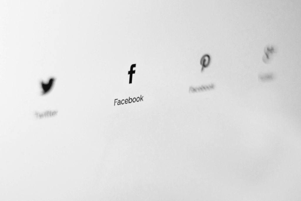 Black and white image of different social media platforms. Don't forget to change all of them when you rebrand!