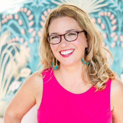 Headshot of Heather Vickery in a bright pink top